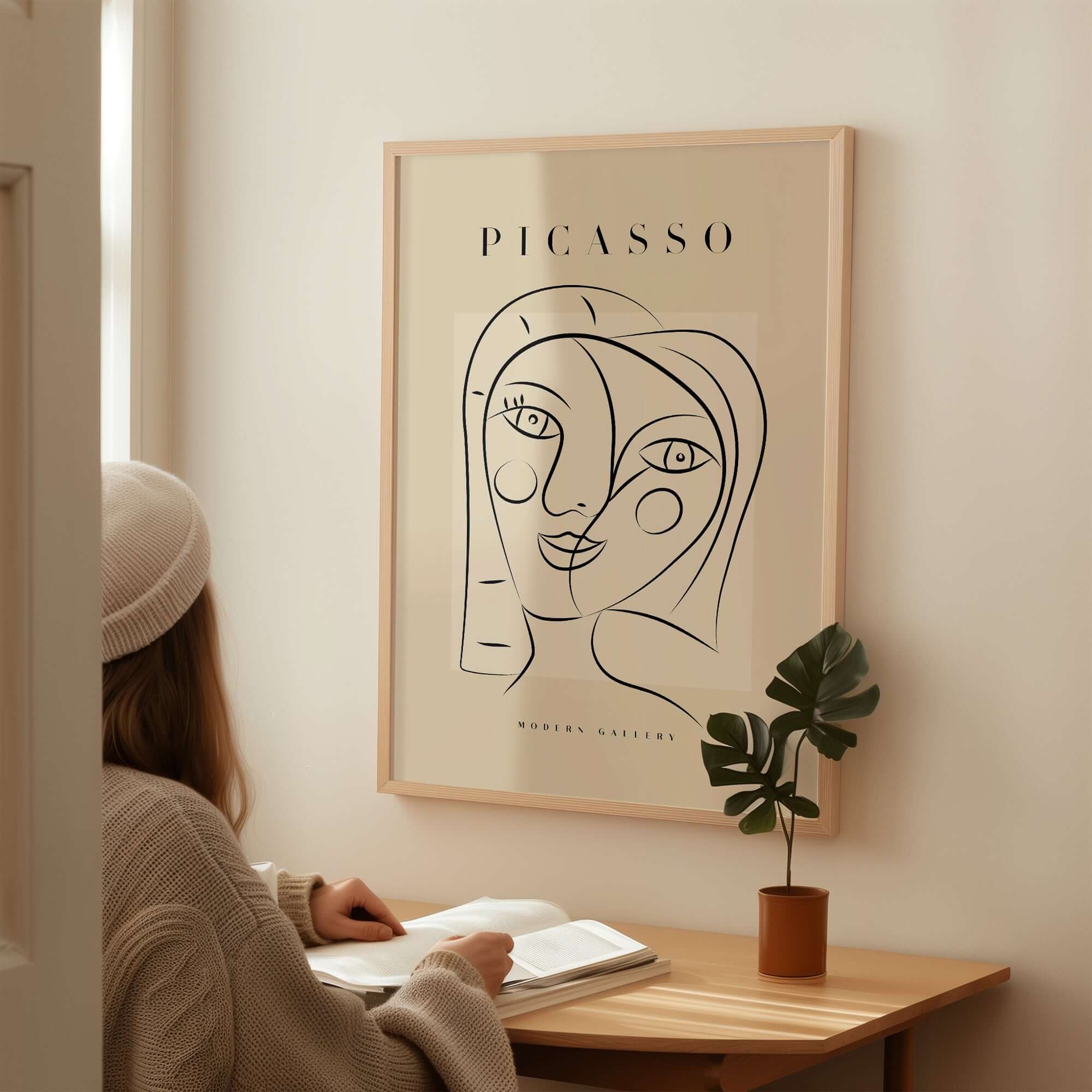 Picasso Smiling Double Face Abstract Portrait Line Art Modern Gallery Poster Print on wall with woman reading