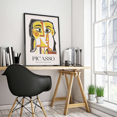 Picasso Stylized Portrait Jacqueline 1962 Abstract Art Print Yellow Red Poster displayed in a modern workspace.