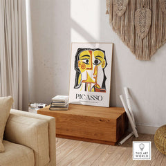 Picasso Stylized Portrait Jacqueline 1962 Abstract Art Print Yellow Red Poster displayed in a modern living room setting.