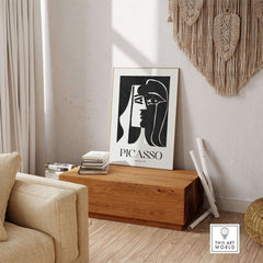 Picasso The Kiss 1979 Black White Abstract Profile Poster Art Print Wall Decor displayed in a modern living room.