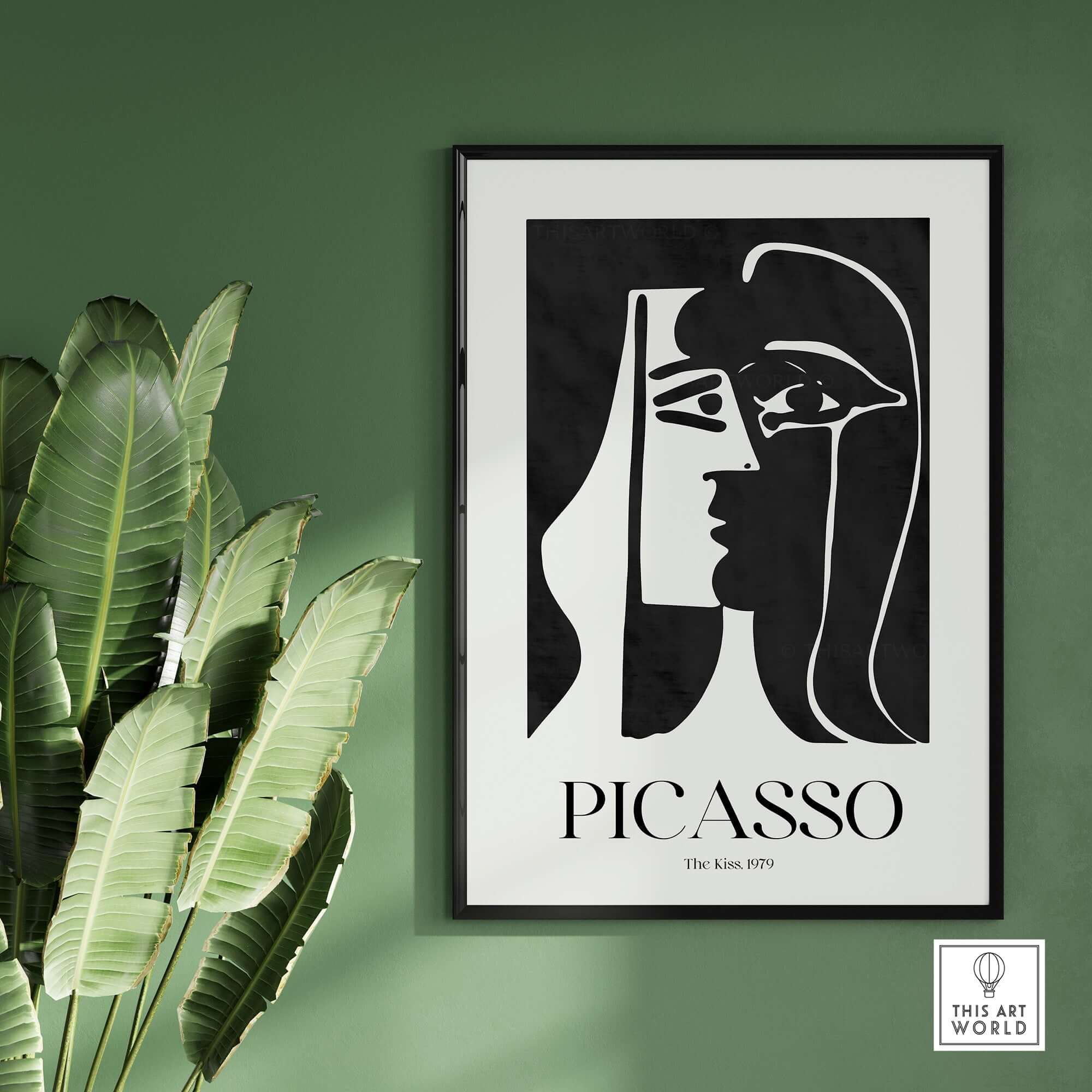 Picasso The Kiss 1979 Black White Abstract Profile Poster Art Print Wall Decor framed on a green wall with plants.