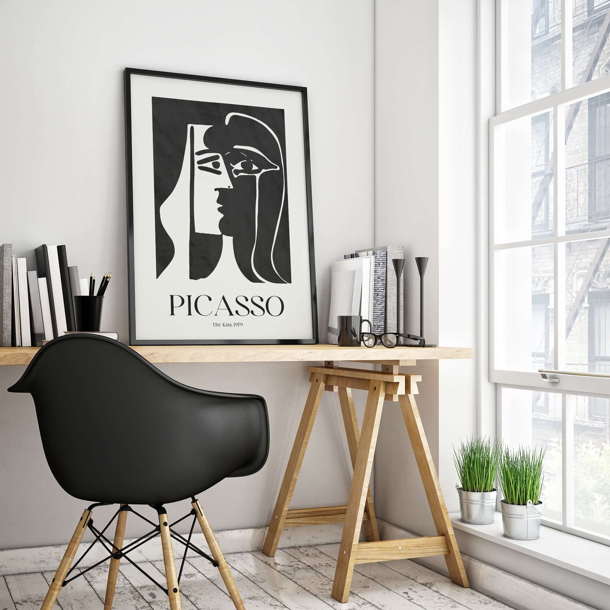 Picasso The Kiss 1979 Black White Abstract Profile Poster Art Print Wall Decor framed in modern office interior.