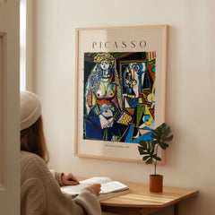 Picasso The Women of Algiers 1955 Art Print Famous Cubist Painting Poster Wall Art displayed beside a woman reading.