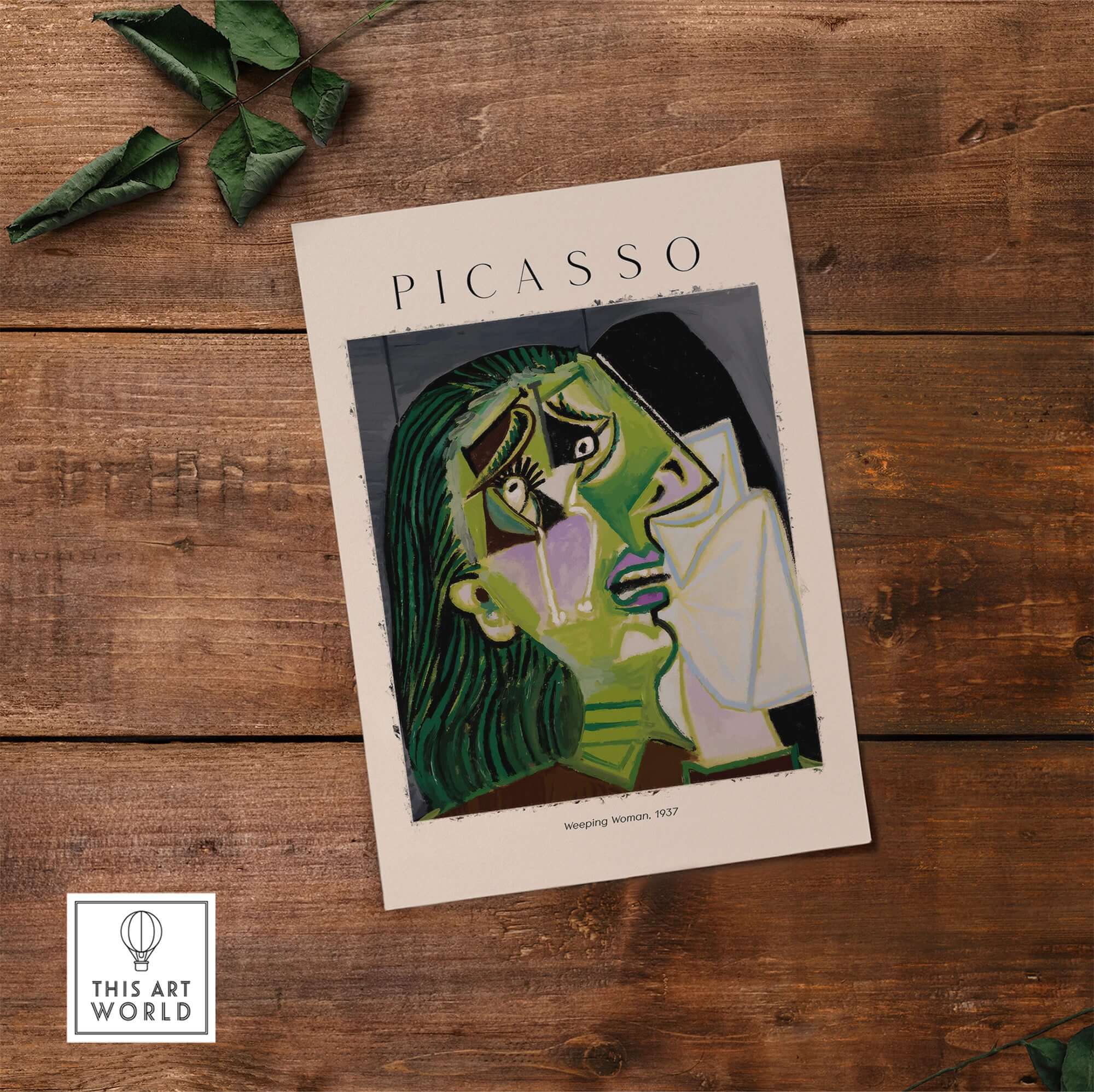 Picasso Weeping Woman 1937 Art Print Famous Cubist Portrait Poster Emotional Wall Art displayed on wooden surface.