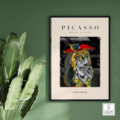 Picasso Weeping Woman Inspired Art Print Abstract Portrait Poster Artwork Collection displayed on a green wall.