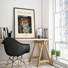 Picasso Weeping Woman Inspired Art Print Abstract Portrait Poster Artwork Collection displayed on a desk with modern decor.