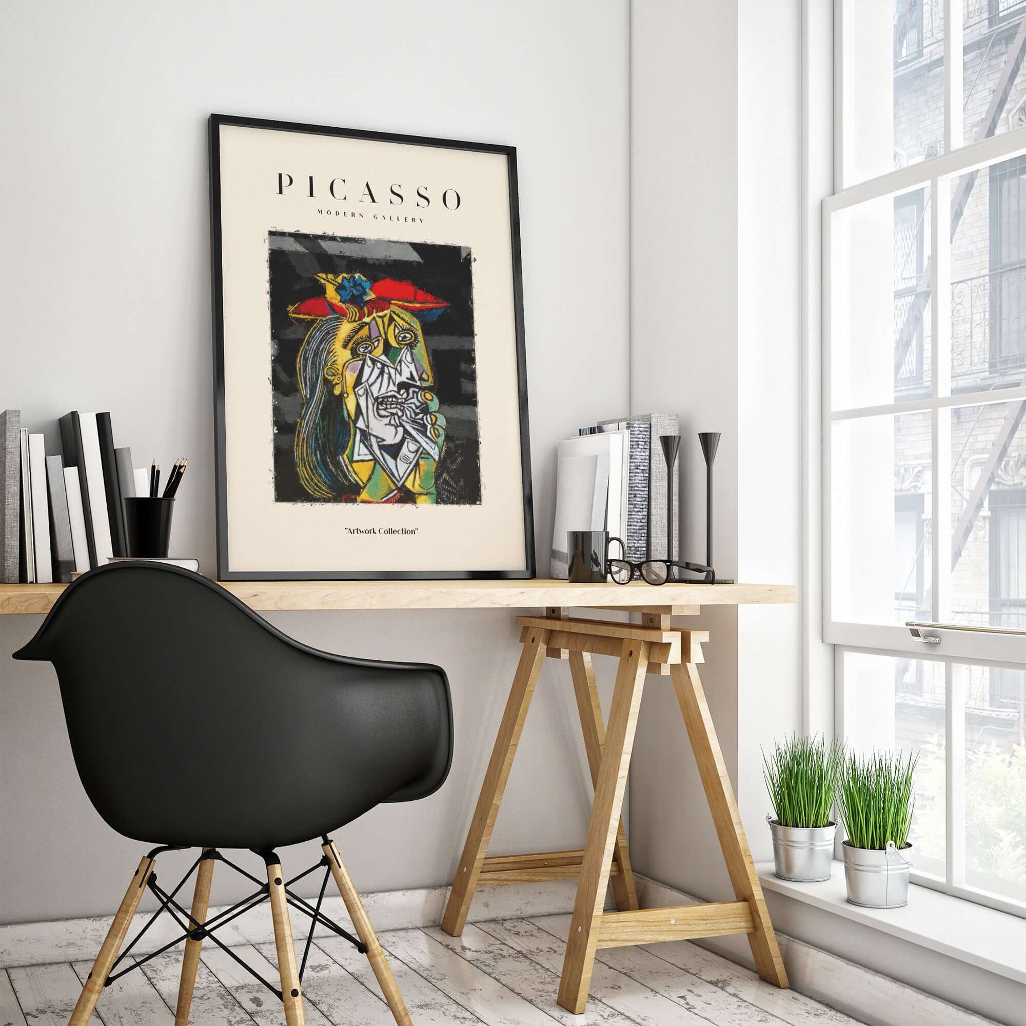 Picasso Weeping Woman Inspired Art Print Abstract Portrait Poster Artwork Collection displayed on a desk with modern decor.