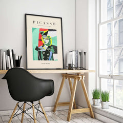 Picasso Woman Black Jacket Abstract Portrait Poster Cubist Style Artwork Print Collection displayed in a modern workspace.