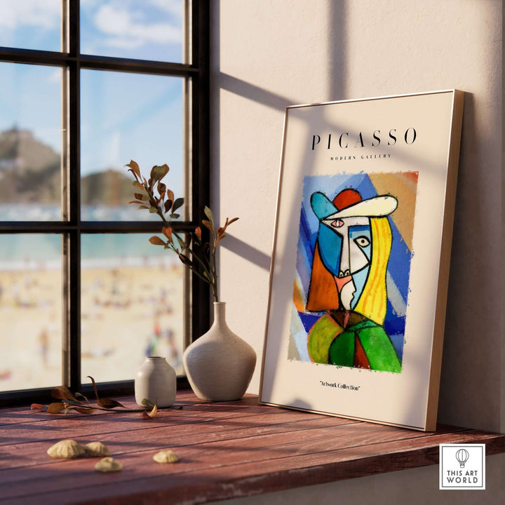 Colorful abstract portrait of a woman in a hat, inspired by Picasso's Cubist style, displayed in a modern setting.