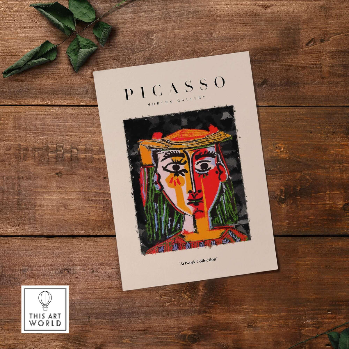 Picasso Woman in Hat Red Yellow Face Portrait Poster Colorful Abstract Artwork Print displayed on wooden background.