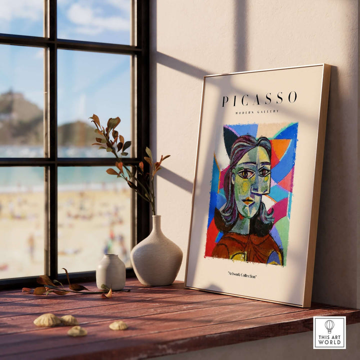 Colorful Picasso-inspired woman portrait abstract poster in modern gallery setting by a sunlit window.