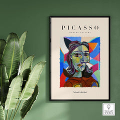 Picasso Woman Portrait Fragmented Abstract Poster Colorful Artwork Print Modern Gallery displayed on green wall.