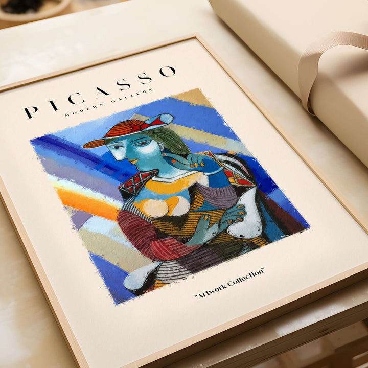 Cubist portrait art print of a woman with blue face and red hat, part of the Picasso-inspired artwork collection.