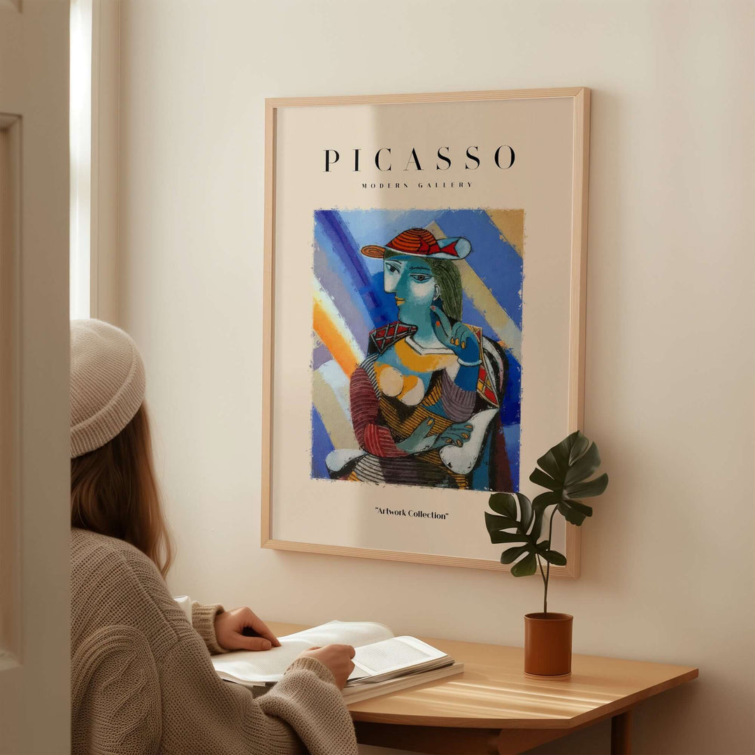 Colorful Picasso-inspired woman portrait print in blue and red, displayed in a modern setting.