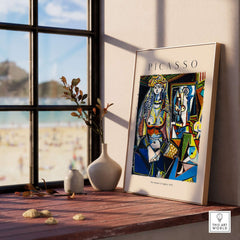 Picasso The Women of Algiers 1955 Art Print Famous Cubist Painting Poster Wall Art displayed on a wooden table.