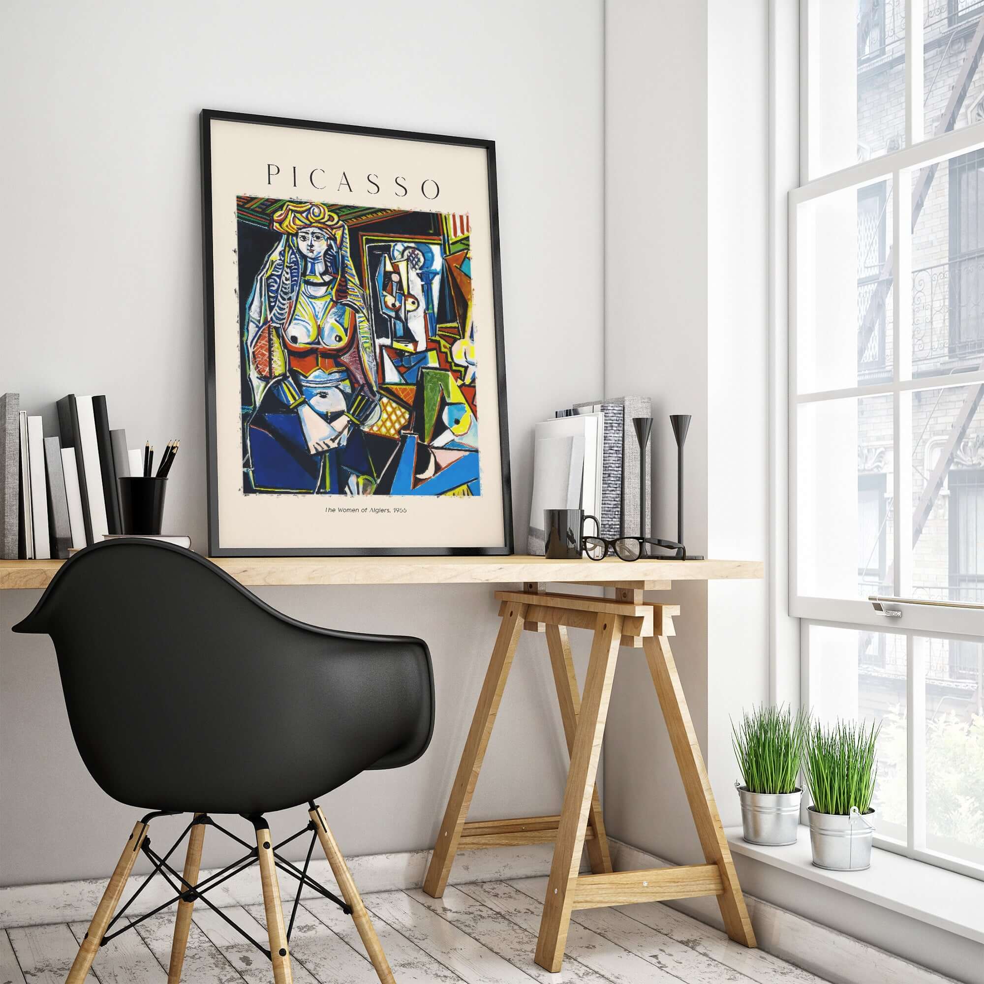Picasso The Women of Algiers 1955 Art Print Famous Cubist Painting Poster Wall Art displayed in a modern workspace.