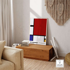 Piet Mondrian Composition Red Blue Yellow 1930 Abstract Art Print Poster Geometric displayed in a living room setting.