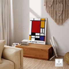 Piet Mondrian Composition Red Yellow Blue 1939 De Stijl Poster Geometric Abstract Print displayed in a modern interior.