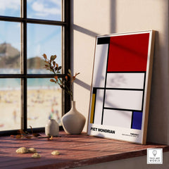 Piet Mondrian Tableau I 1921 De Stijl Abstract Geometric Poster Modern Art Print displayed by a window.