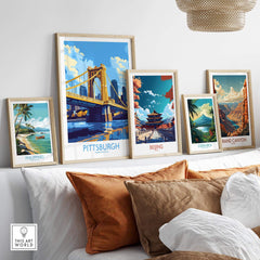 Pittsburgh Travel Poster among other travel posters on a stylish wall decor display.