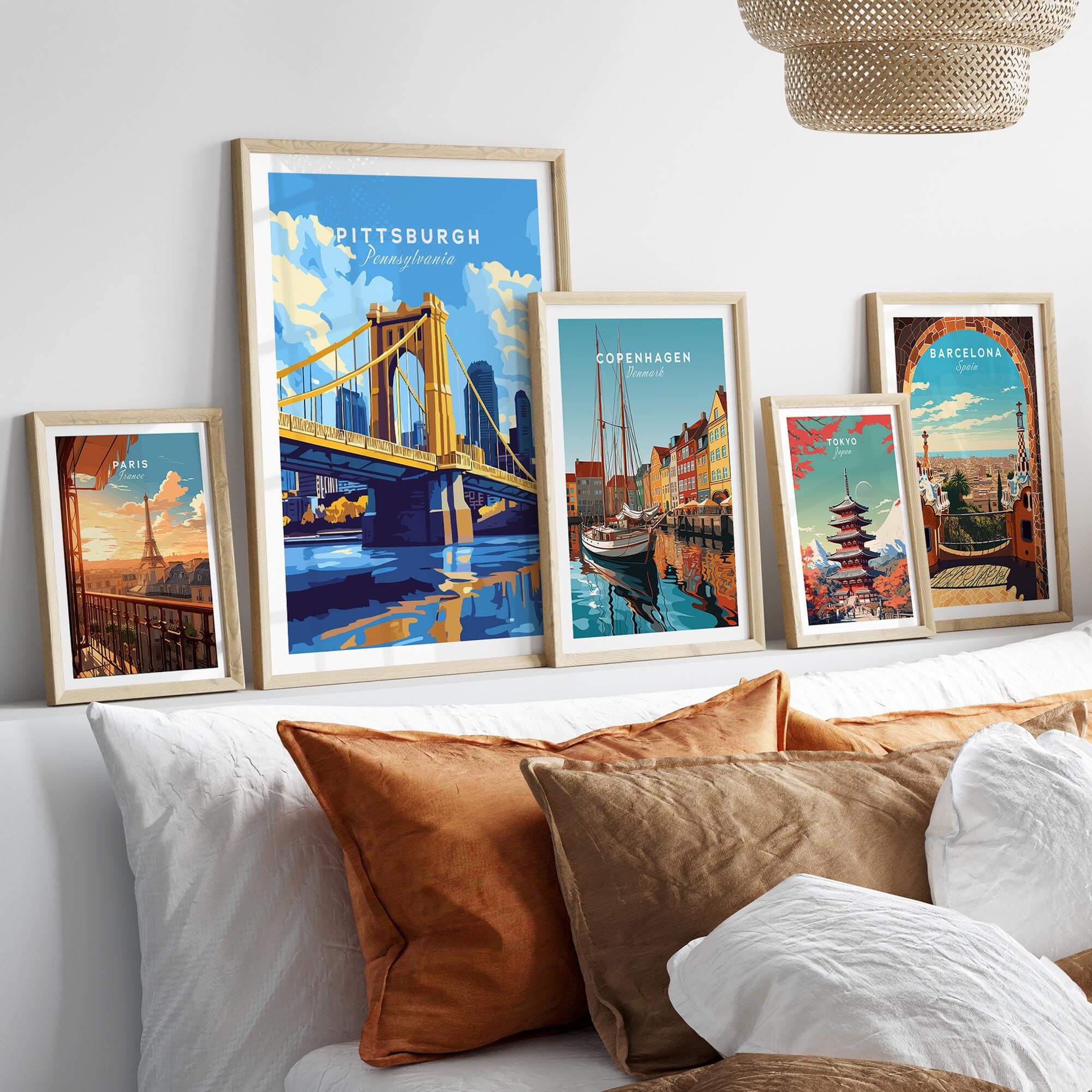 Pittsburgh Travel Print showcased among various travel poster prints, adding vibrant decor to a modern home setting.