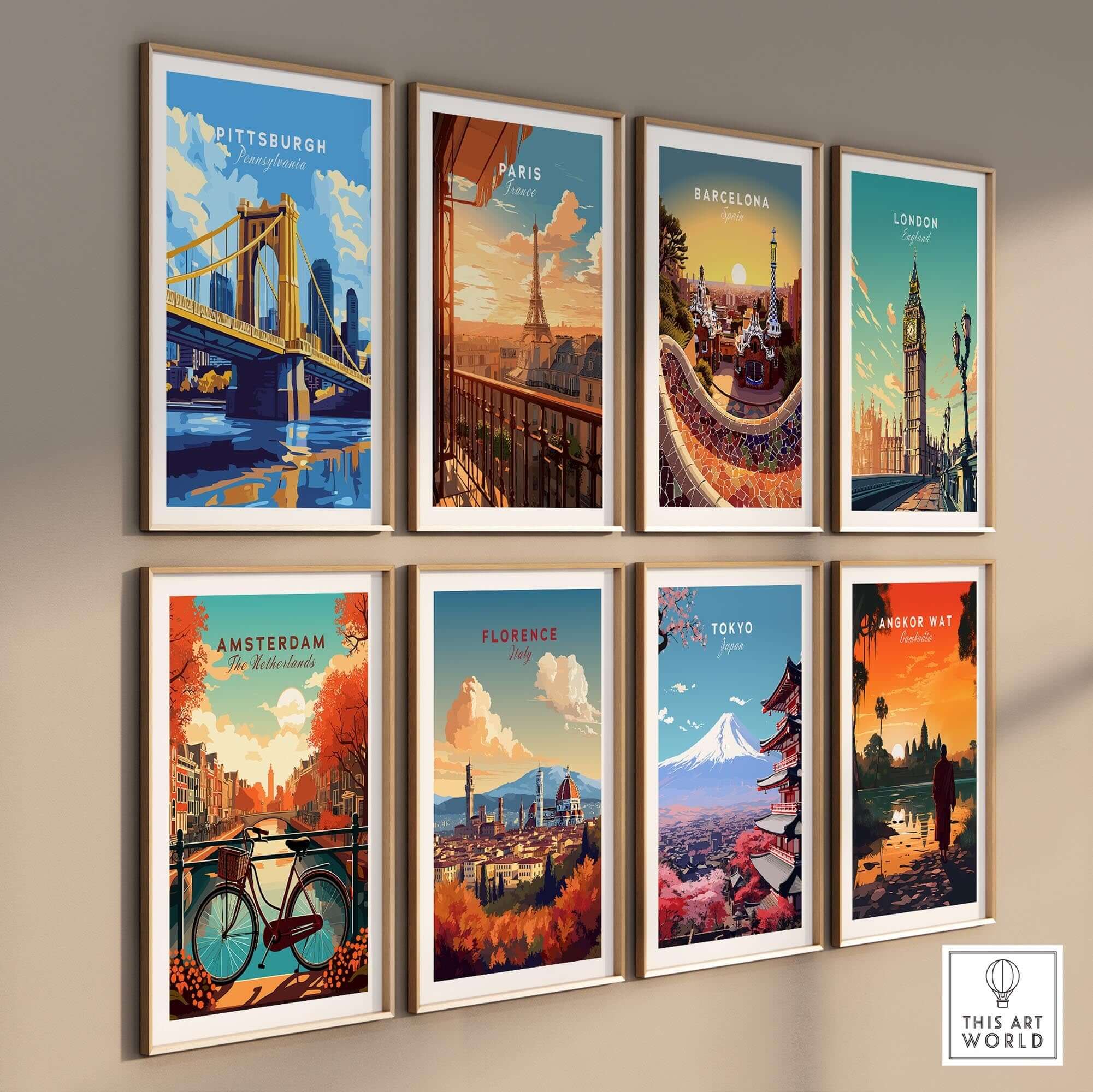 Framed Pittsburgh Travel Print and other city posters showcasing landmarks and vibrant colors.