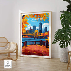 Pittsburgh Wall Art Print showcasing vibrant fall colors and city skyline in a cozy living space.