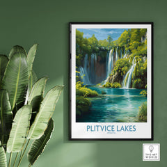 Plitvice Lakes Waterfall Poster, Croatia Travel Print, Blue Lake Wall Decor framed on a green wall with leafy plants.