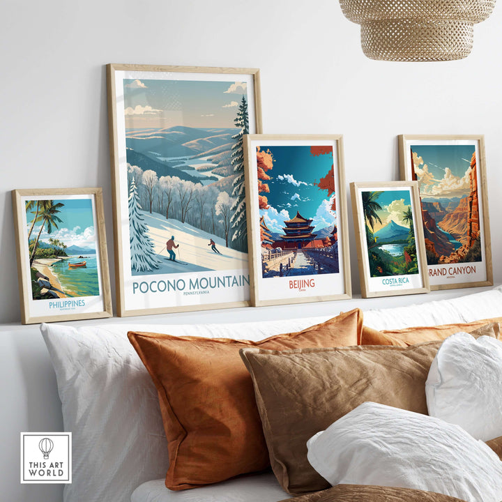 Pocono Mountains Alpine Slopes wall art above a cozy couch, showcasing travel destinations and adventure decor.