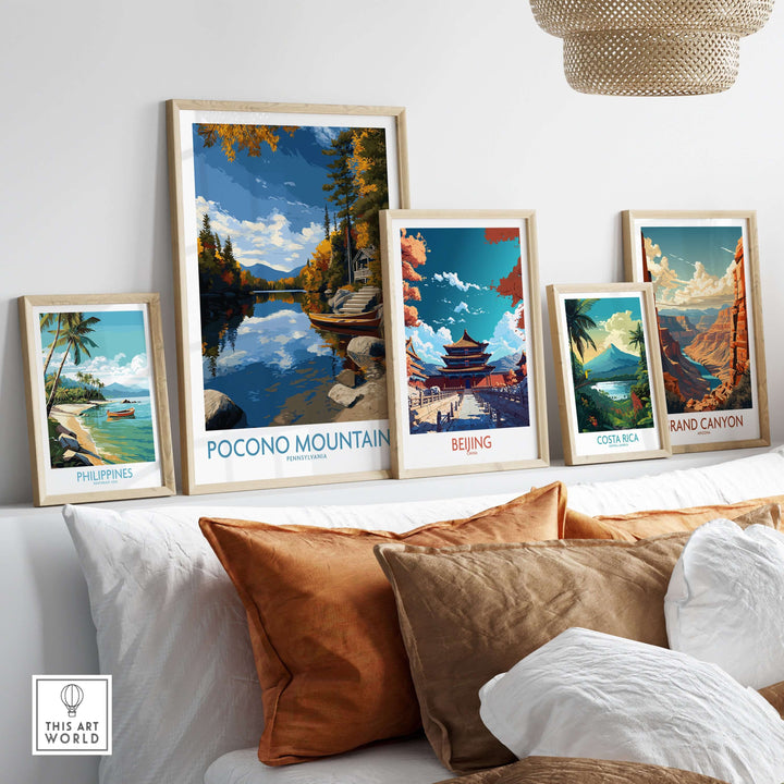 Pocono Mountains Autumn Lake view wall art displayed among travel-themed prints in a cozy living room setting.