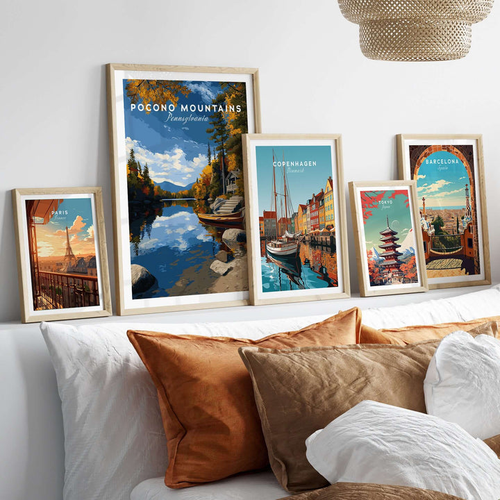 Lakeside art prints decorating a cozy living room in an elegant arrangement, featuring Pocono Mountains and cityscapes.