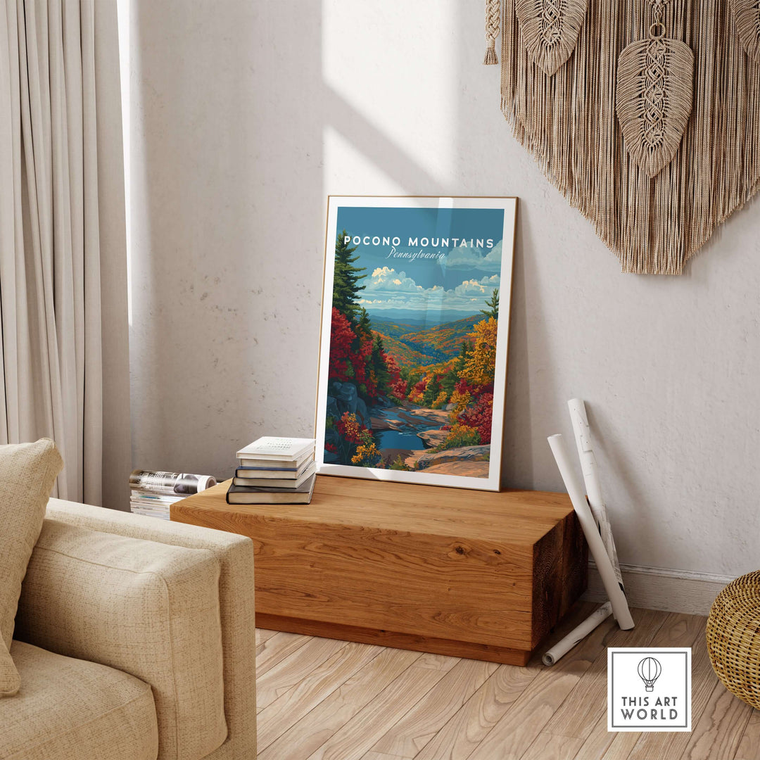 Pocono Mountains poster displayed in a cozy living room, showcasing vibrant fall scenery and tranquil valley views.