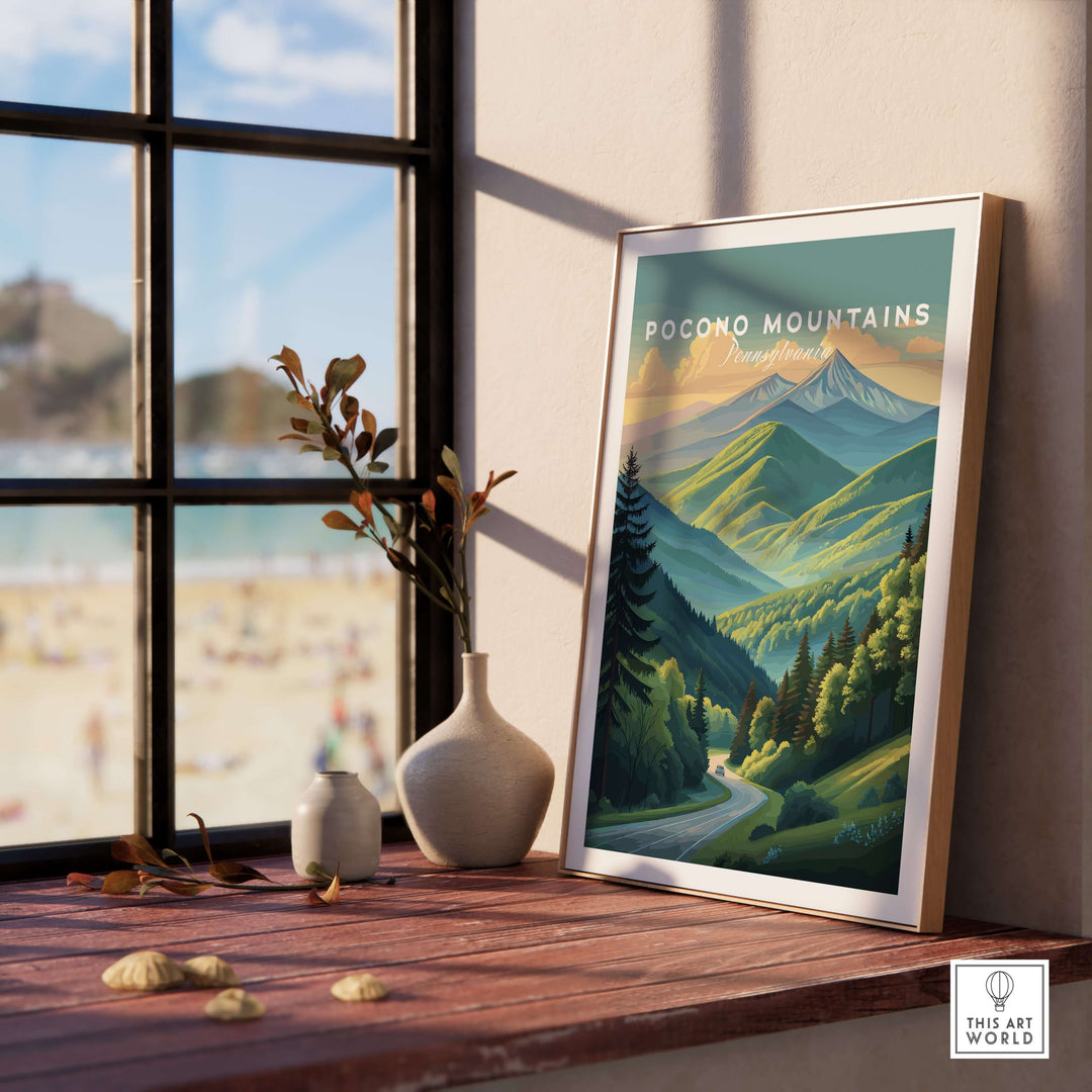 Pocono Mountains Pennsylvania scenic drive poster featuring a green valley, displayed in a cozy interior setting.
