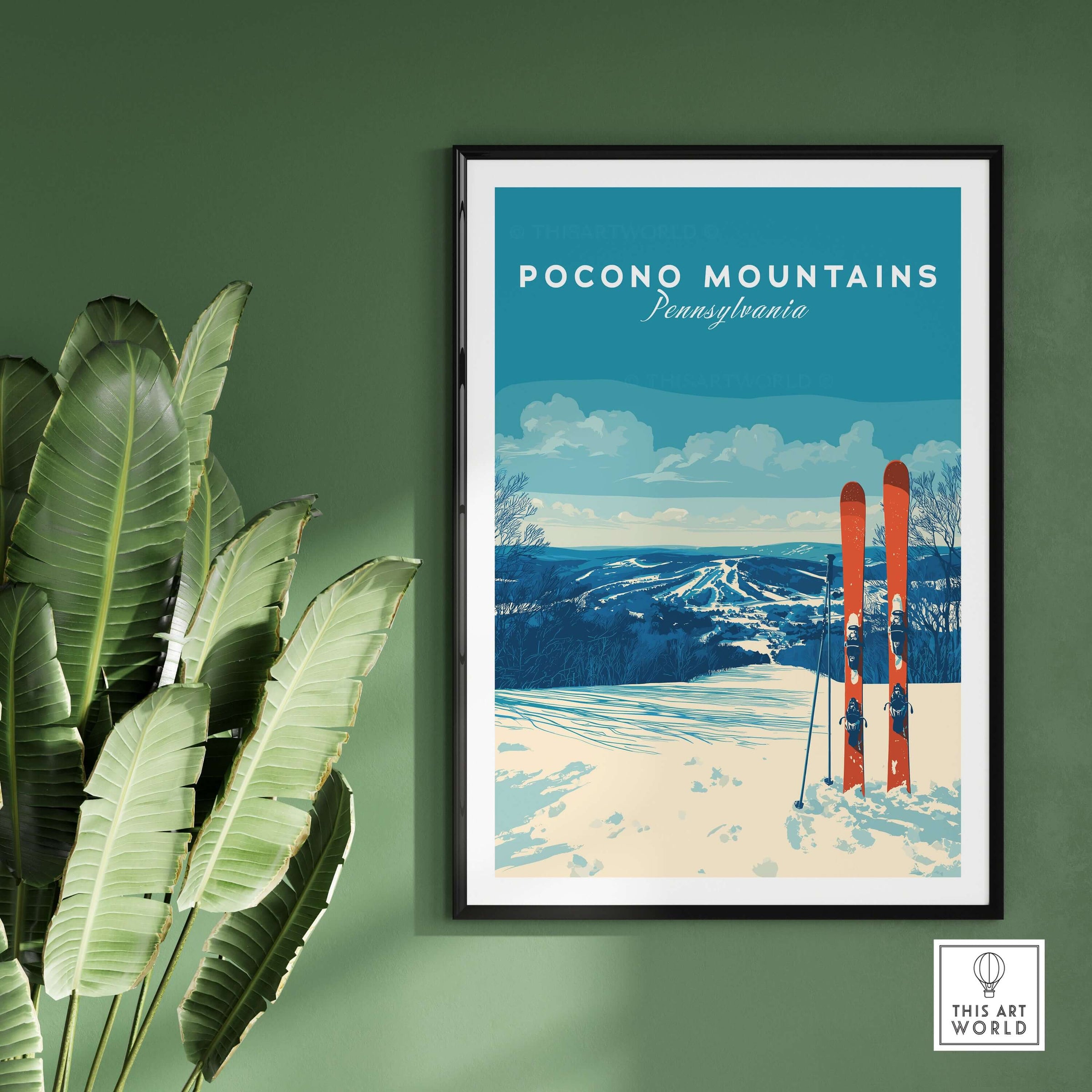 Pocono Mountains Ski Resort poster featuring winter sports scenery, framed and displayed with greenery.