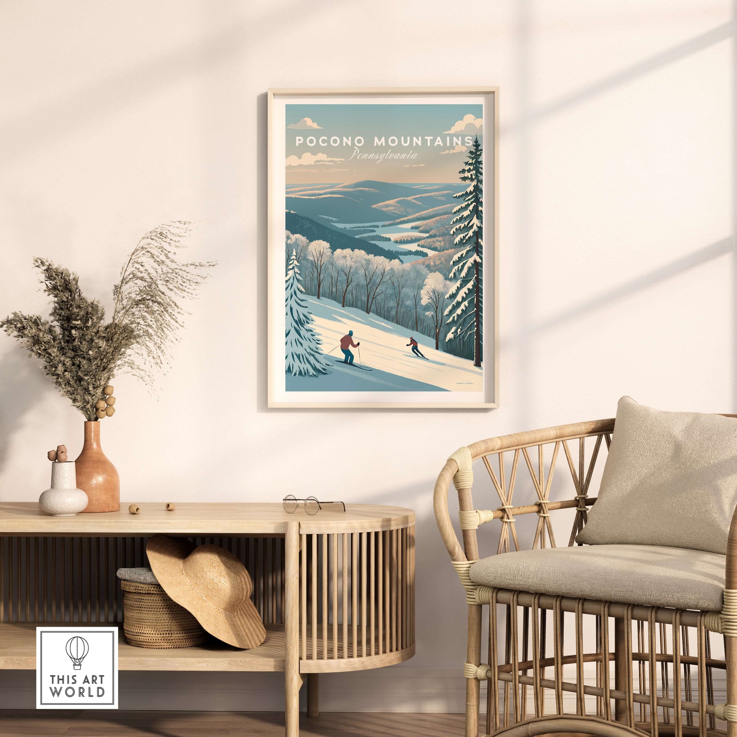 Pocono Mountains ski run poster displayed in a stylish living room, featuring winter mountain scenery and skiers.