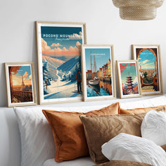 Pocono Mountains Ski Wall Art Print displayed on a cozy bed, capturing vibrant skiing scenes and travel destinations.
