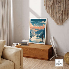 Pocono Mountains Ski Wall Art Print showcasing vibrant ski scene in cozy interior setting.