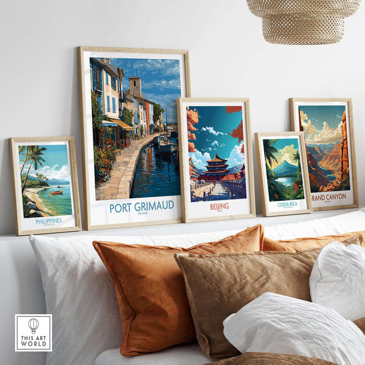 Framed travel posters including Port Grimaud Marina, showcasing coastal scenes and iconic landmarks in stylish decor.