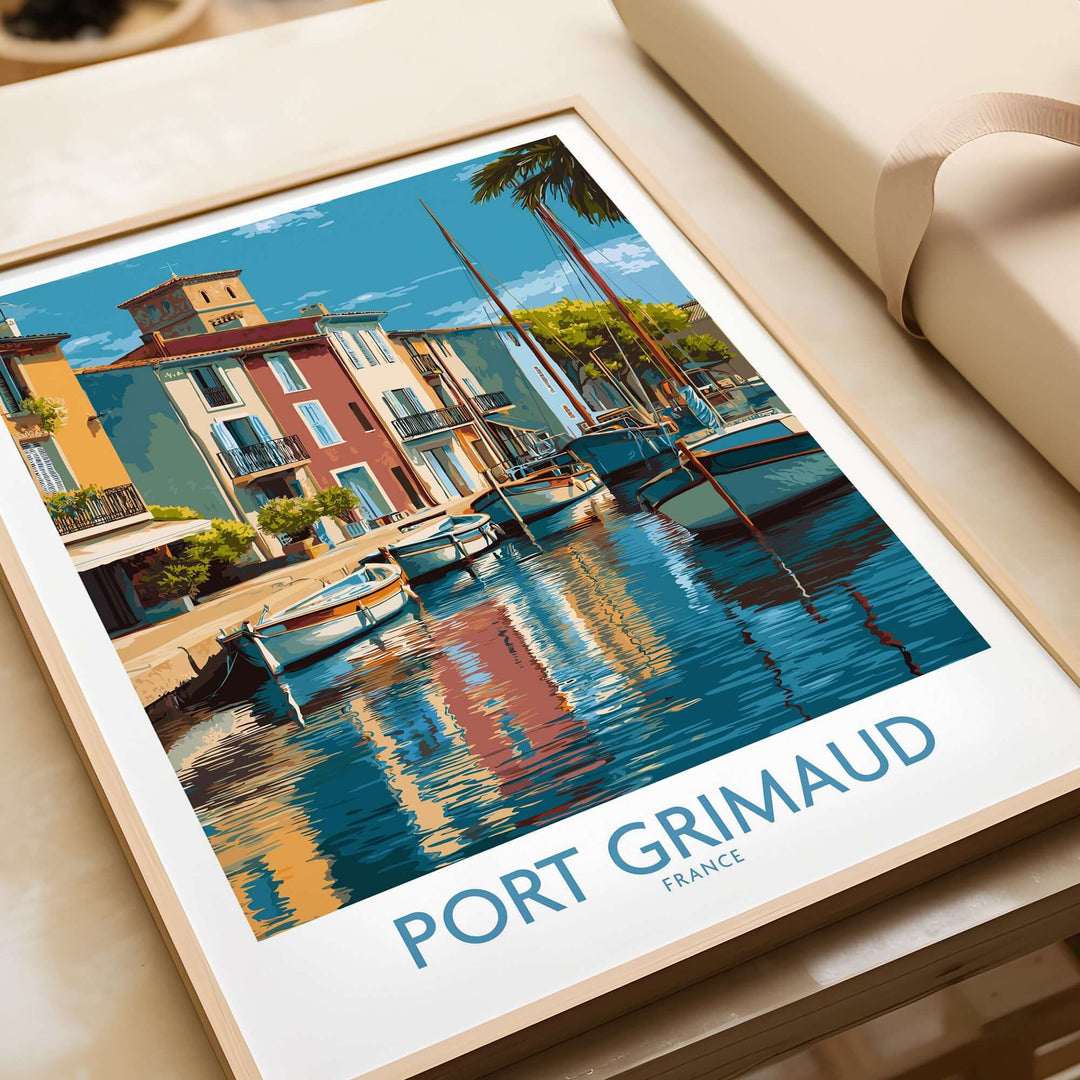 Port Grimaud poster featuring colorful buildings and boats reflecting in water, ideal for French Riviera decor.