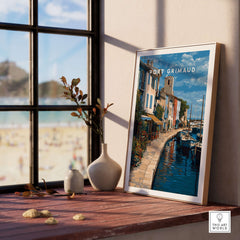 Port Grimaud Poster - Venice of Provence Wall Art - Colorful Buildings and Canal Print displayed in a bright room.