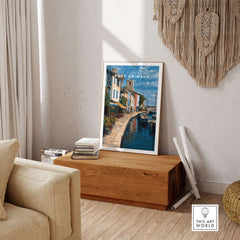 Port Grimaud Poster - Venice of Provence Wall Art - Colorful Buildings and Canal Print displayed in a cozy living room.