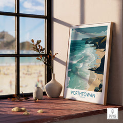 Porthtowan Cornwall Poster | British Seaside Cliff Landscape Canvas Print displayed on a table beside a window.