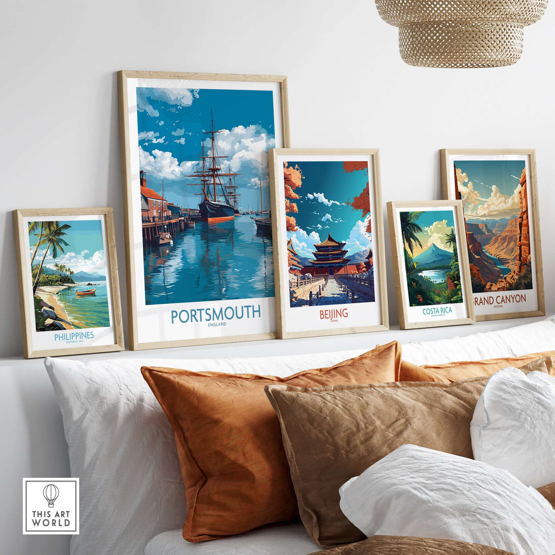 Portsmouth England Art Print | Naval Dockyard Poster displayed among other travel-themed art prints on a stylish interior shelf.