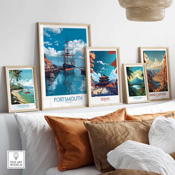 Portsmouth England Art Print | Naval Dockyard Poster displayed among other travel-themed art prints on a stylish interior shelf.