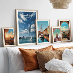 Framed Portsmouth Print | Hampshire Coast Wall Decor alongside other city prints on a stylish bedhead.