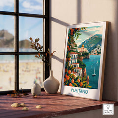 A beautiful Positano Wall Art print showcasing the colorful scenery of Positano, Italy, elegantly displayed by a window.