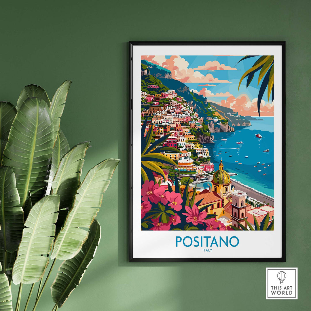 Positano Wall Art Coastal Print for Home or Office Decor featuring the picturesque Italian town displayed on a green wall with plants.