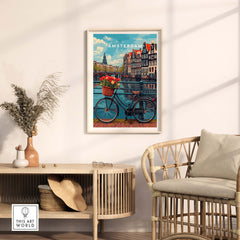Amsterdam poster with bike and tulips, showcasing the city's charm, displayed in a cozy room setting.