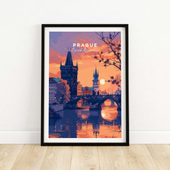 Prague Poster showcasing a stunning sunset over the city with reflected lights in the water.