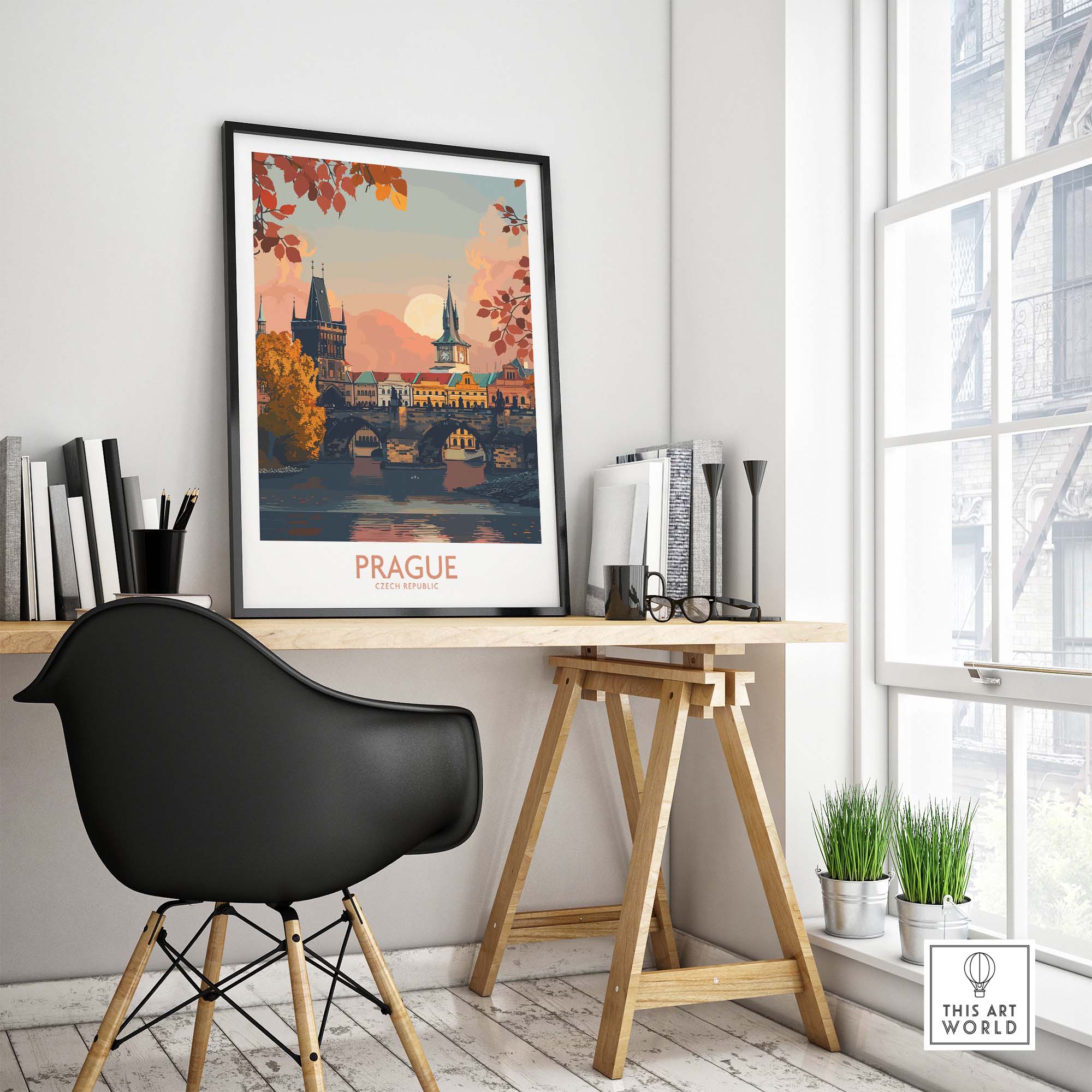 Prague Travel Print displayed in a modern workspace featuring historic architecture and vibrant colors.